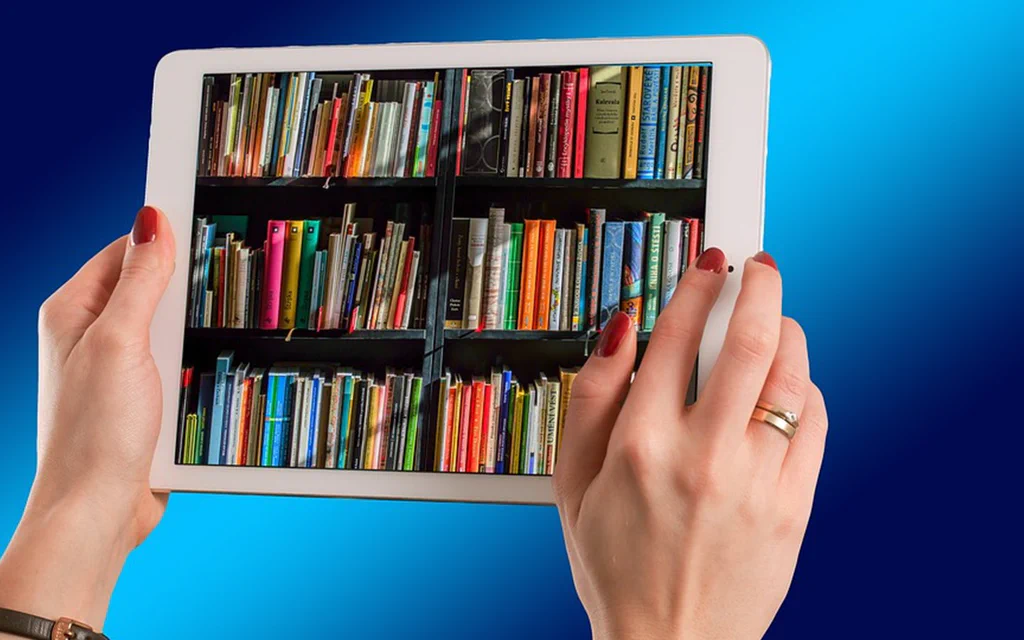 A tablet being used for reading, representing low-cost media and family tablet shopping.